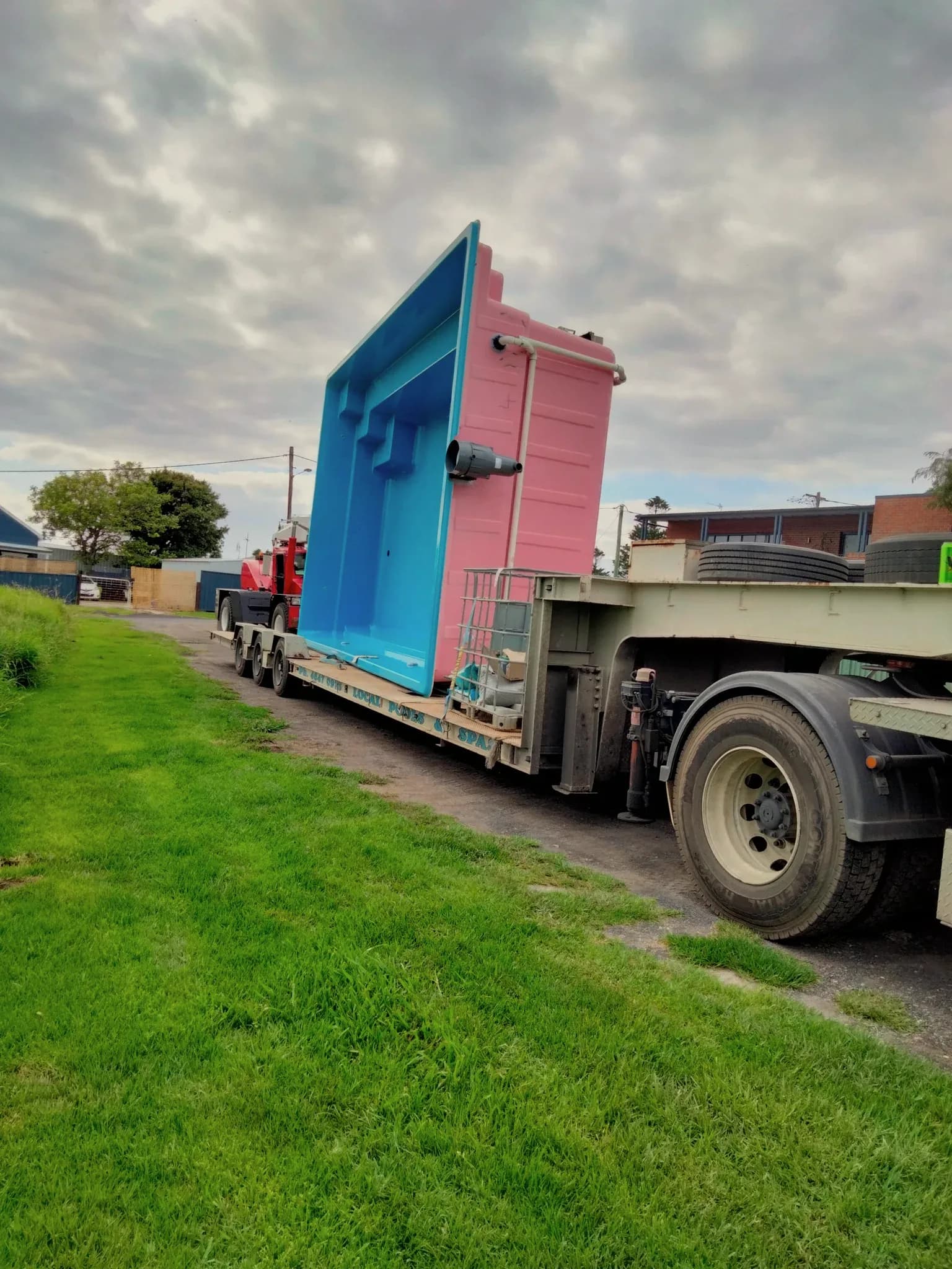 Greenwell — The pool shell arriving on a truck