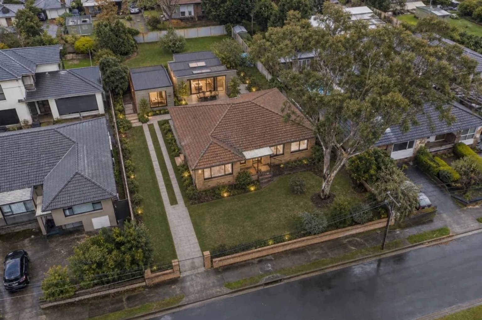 Illustrative concept — the same property with a secondary dwelling and landscaping in the rear yard