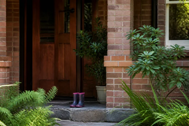 Durable brick, timber and tiled details in a calm family living space